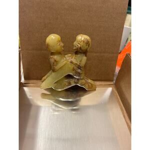 Chinese Hetian jade or nephrite erotic carved figurine. Man and woman embracing